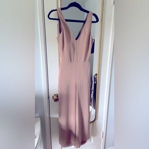 Tan jumpsuit with open back. Wilfred brand purchased at Aritzia. Size 2